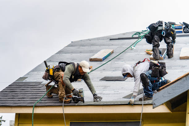 Professional Roofing technician working in Breesport, NY